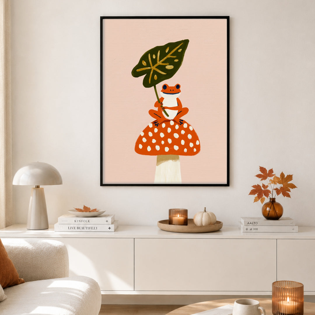 Frosch auf Fliegenpilz Poster – Schwarzer Rahmen – Produktfoto