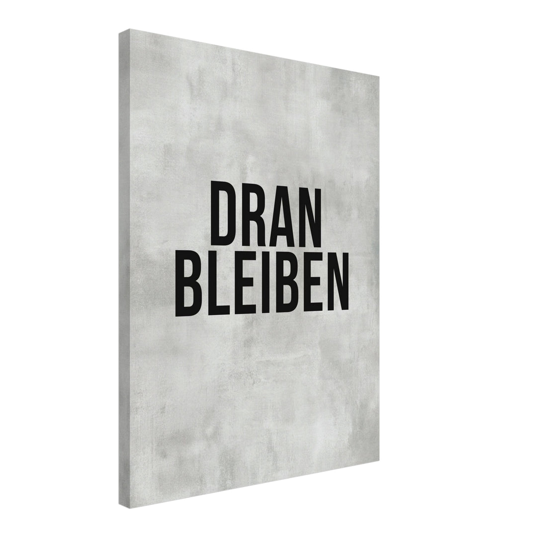 Dranbleiben Typografie grau Leinwand – Schräge Ansicht – Produktfoto